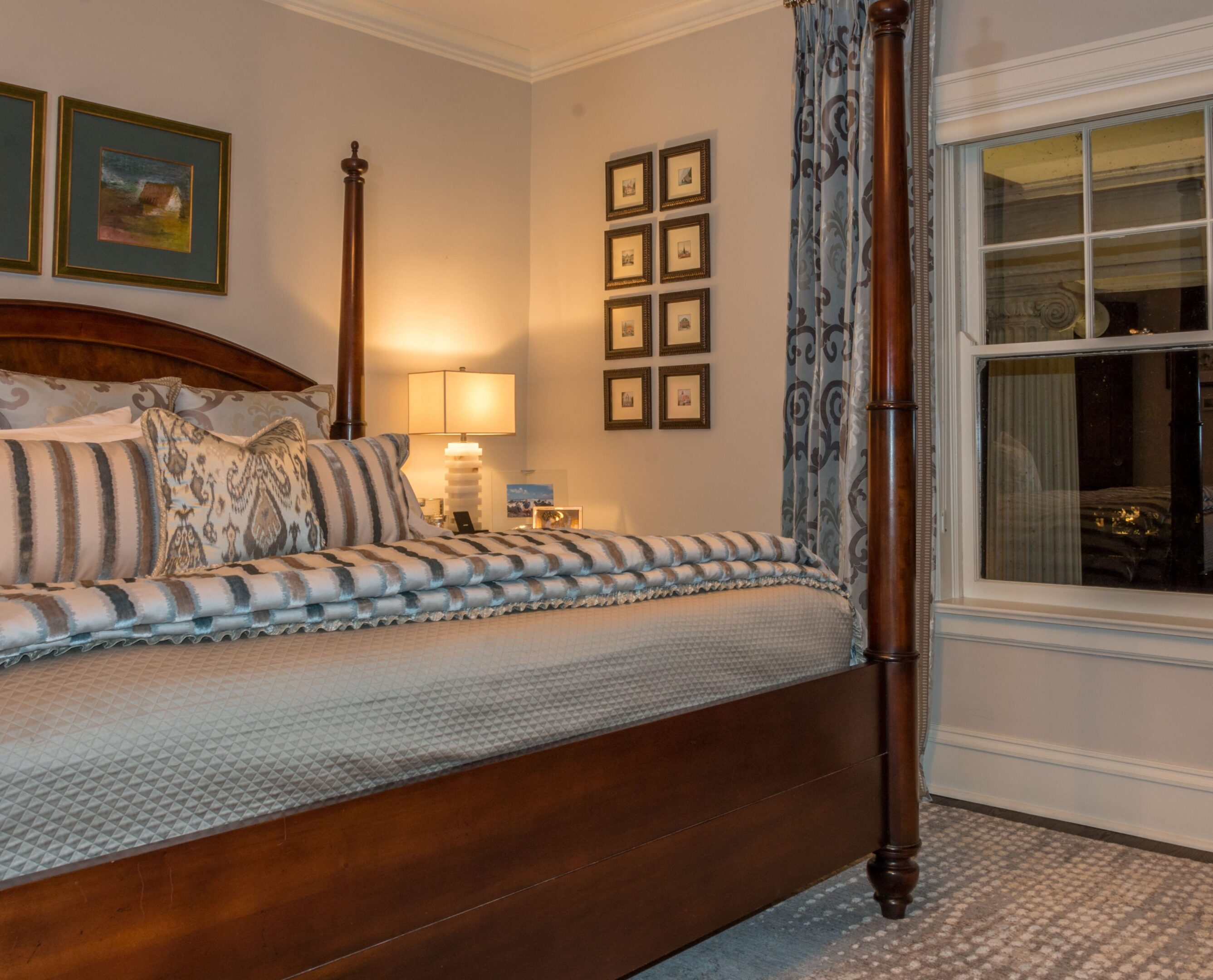 Classic bedroom design with framed art