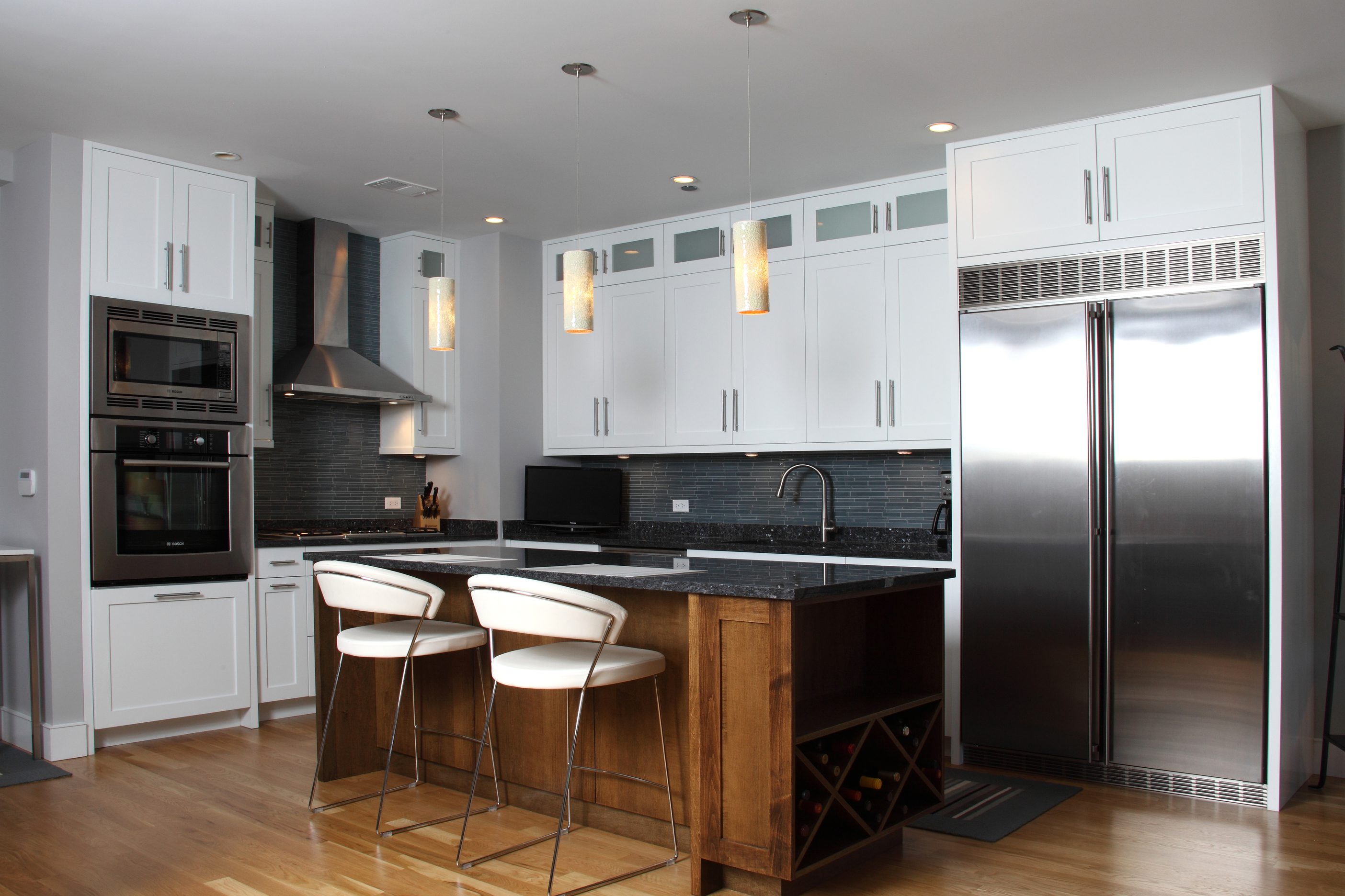 Contemporary kitchen featuring a large fridge