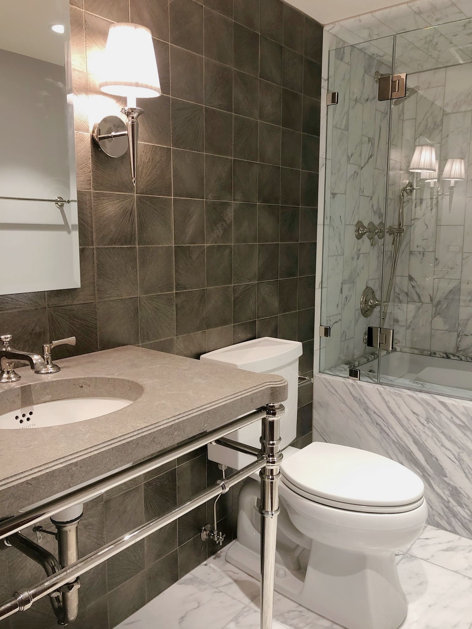 Elegant bathroom with tiled walls