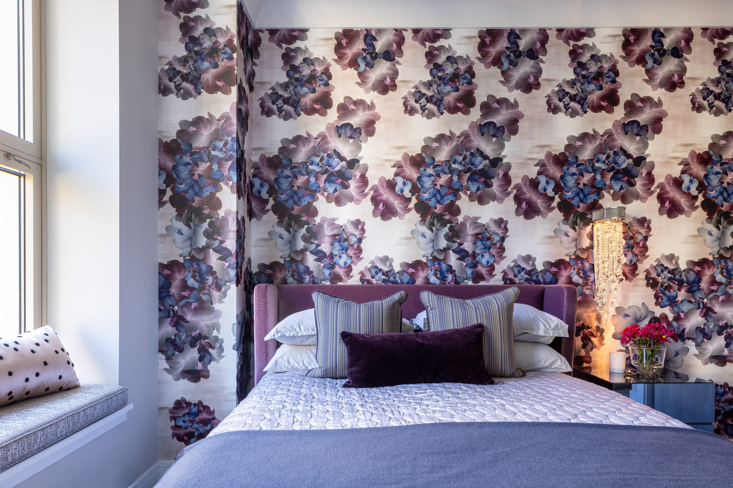 Floral wallpaper bedroom with cozy decor