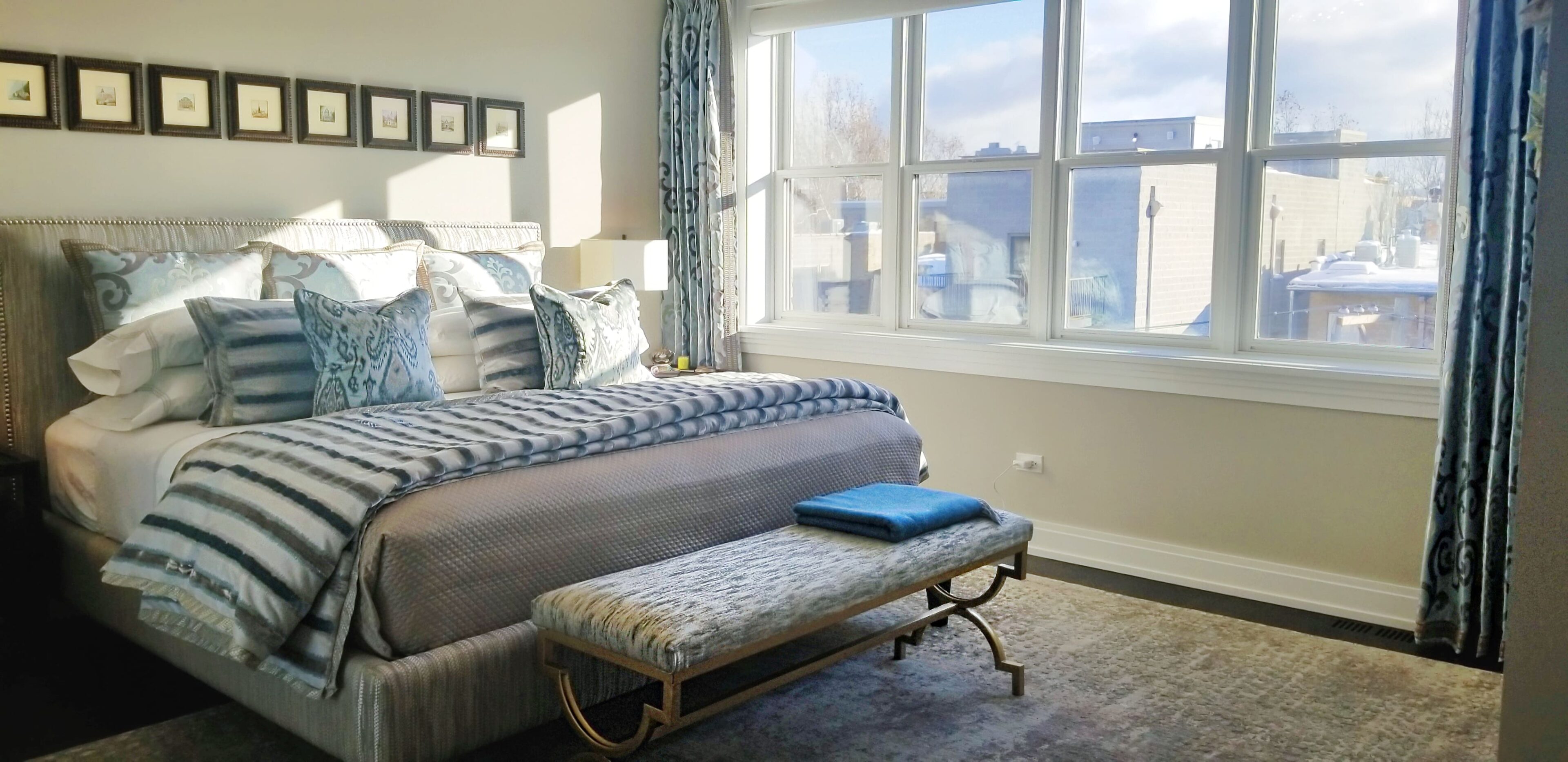 Bright bedroom featuring large windows