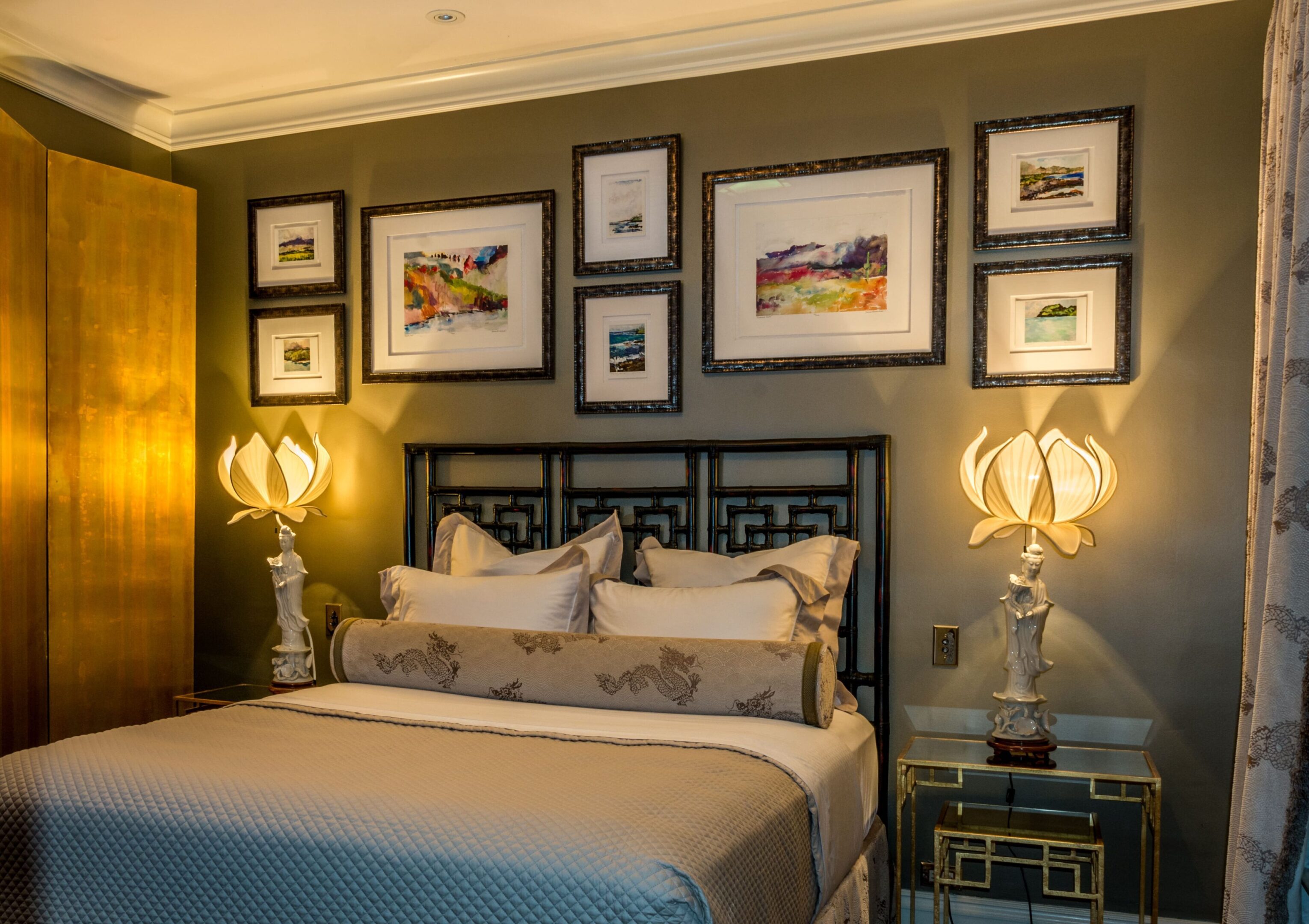 Cozy bed with decorative pillows